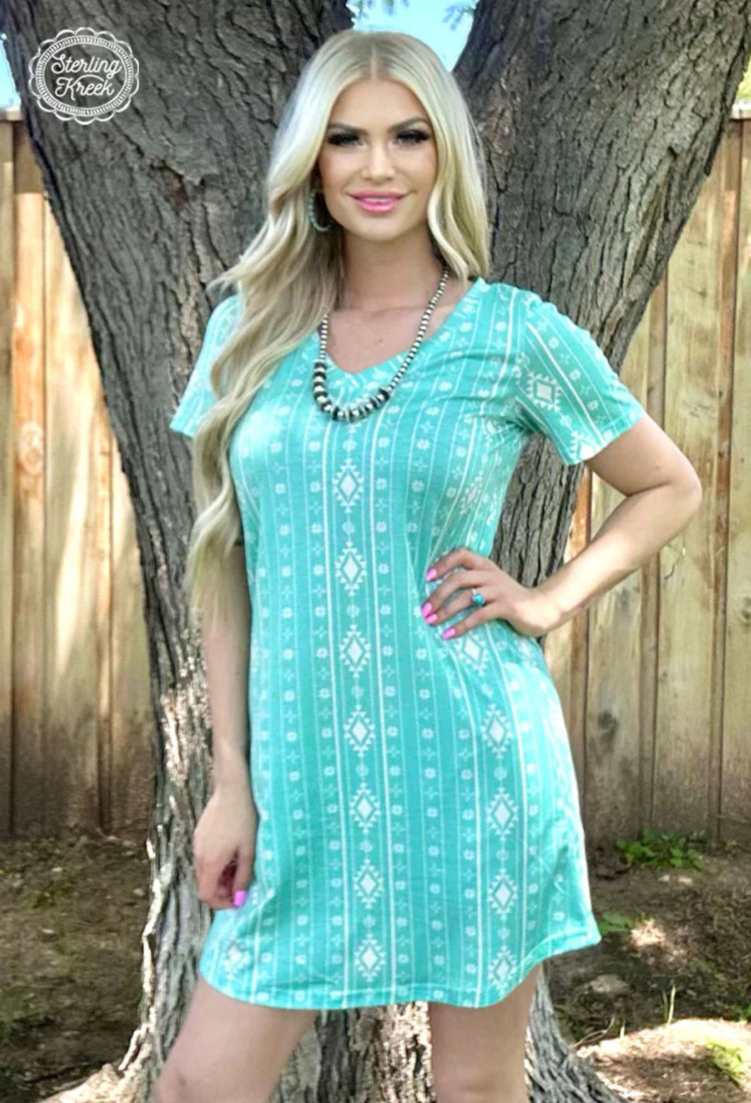 Walking In Turquoise Dress